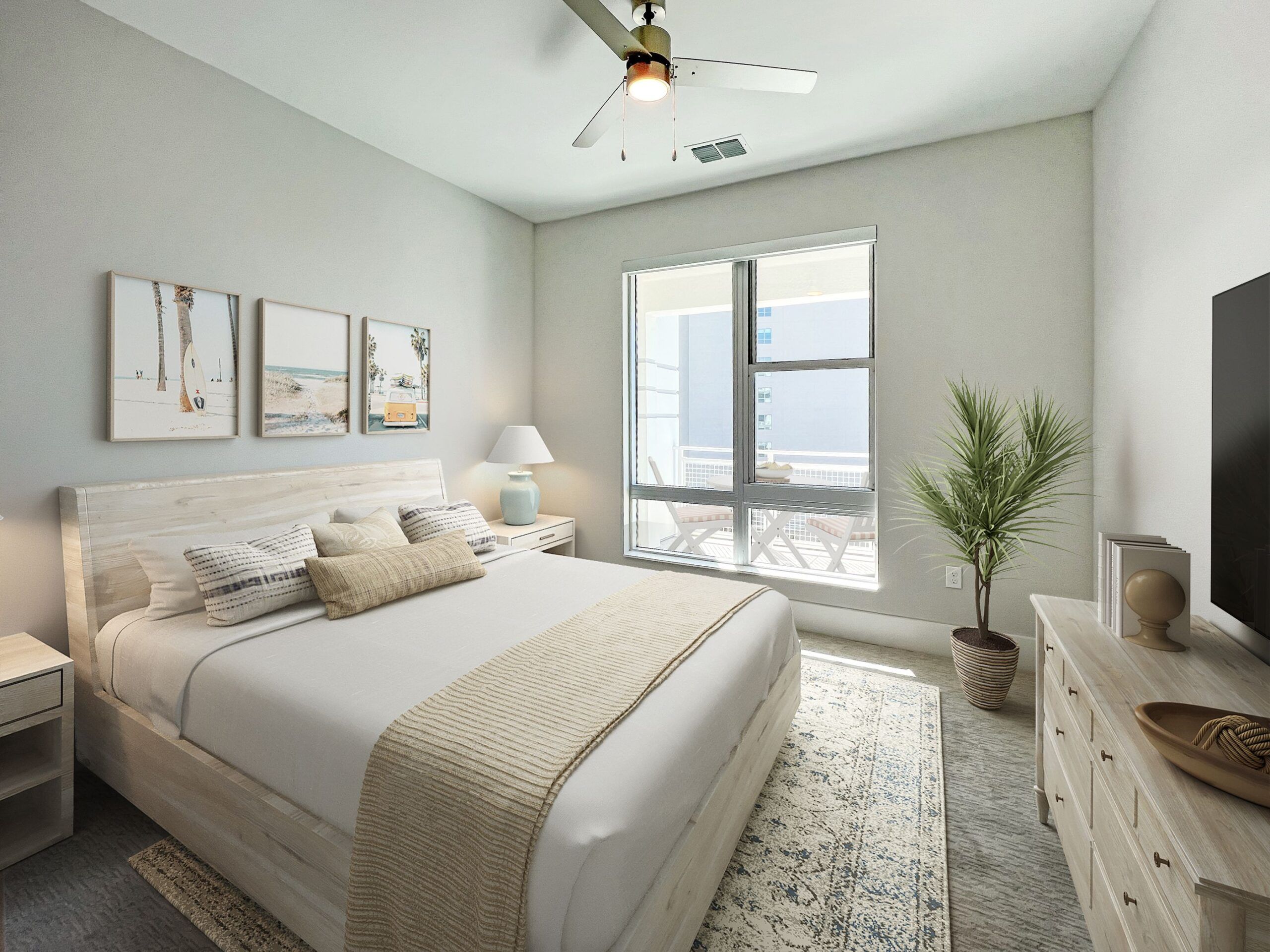 Large bedroom with floor-to-ceiling window and carpet at The Emerson On Rocky Point